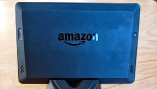 The back of the Kindle Fire HDX with the joystick was taken after