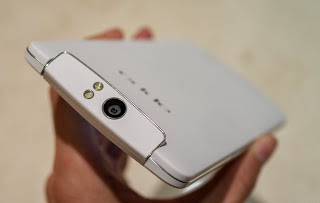 On hand OPPO N1 smartphone, 5.9 inch screen, price $ 740